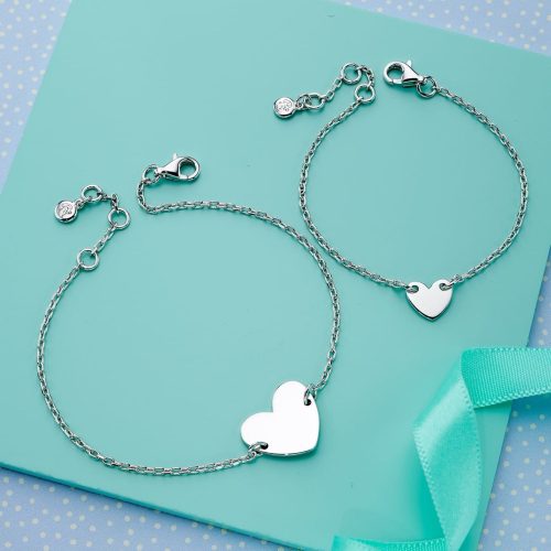 two silver heart bracelets