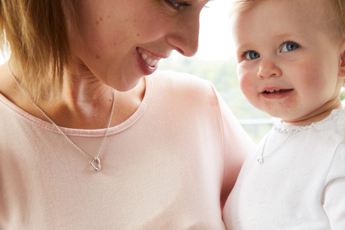 mum and baby with matching necklaces